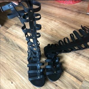 Tall black gladiator sandals